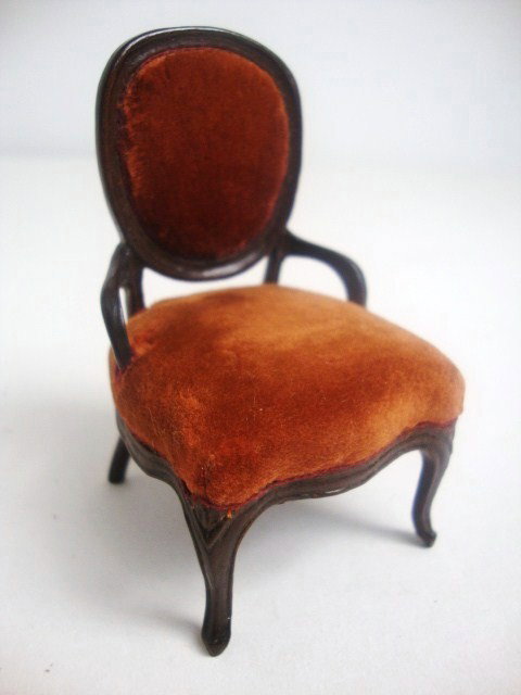 Eric Pearson Victorian Chair: Custom mahogany Rococo Revival chair with carved legs and deep gold velvet upholstery. 3"H, 2" W, 1.75" D.
