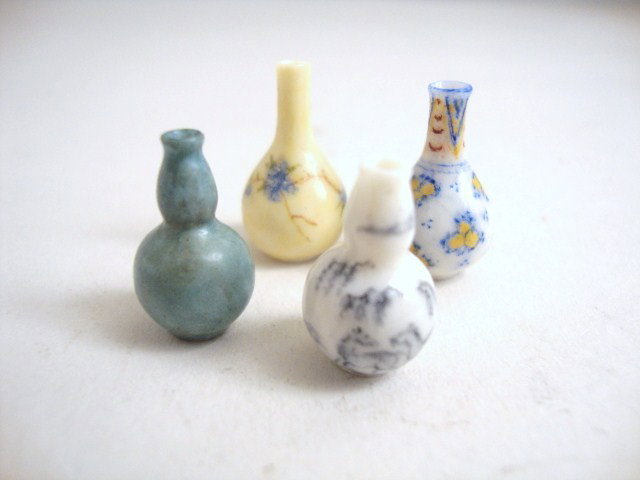 Emily Good Chinese Vases: Four painted Chinese vases in different styles and patterns. 3/4" H.