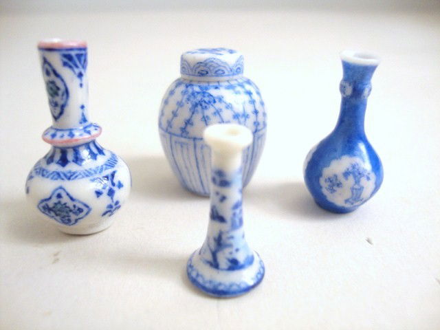 Emily Good Blue and White Porcelain: Blue and white decorated porcelain including a covered ginger jar, two vases and a candlestick. Jar 7/8" H.