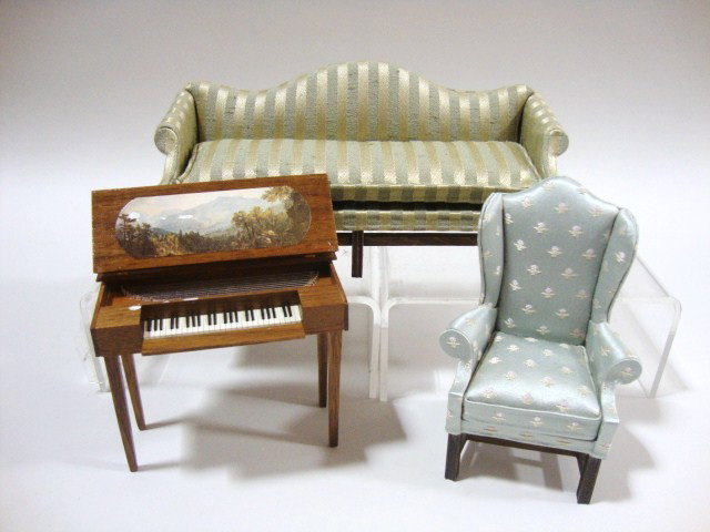 Nellie Belt Seating Group: Beautifully crafted Chippendale sofa 7" L and 3.5" H and a Chippendale pink chair, both by Nellie Belt, with a small mahogany spinet signed CMS 1983 (damage to underside picture)
