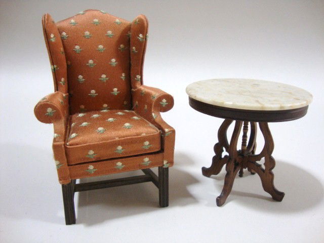 Nellie Belt Chair and Nic Nichols Table: A Chippendale upholstered wing chair 4" H by Nellie Belt and a marble-topped mahogany pedestal table by Nic Nichols 2.5" H, 2.75" dia.