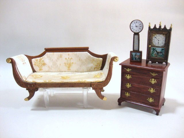 Chestnut Hill Federal Sofa: Chestnut Hill Duncan Phyfe settee (missing bolsters) 7" L, 3" H, a pair of clocks and a Joe Andrews Chippendale chest of drawers.
