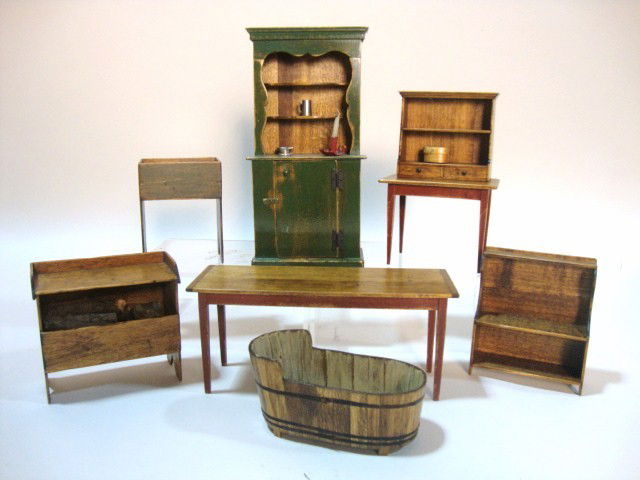 Barbara Davis Country Kitchen Furniture: Nicely finished country furnishings for a kitchen including a painted stepback cupboard 6.25" H, 3" W, 1.5" D, two tables, dry sink, bucket bench, wall shelf, woodbox and washtub. Nice grouping.