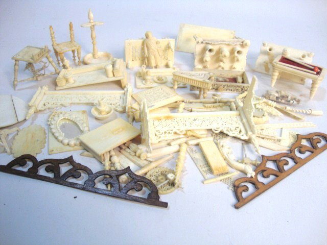 Antique Ivory Umbrella Stand: An antique umbrella stand 2.25" H (missing umbrellas), and a large assortment of ivory and bone miniatures, almost all damaged and missing parts, but useful for repairs.