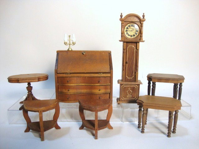Strombecker Walnut Furniture: Three 1930's walnut tables by Strombecker with other vintage items including a larger scale desk 4.5" H, 4.75" W, two Wanner console tables and a walnut grandfather clock 7.5" H.