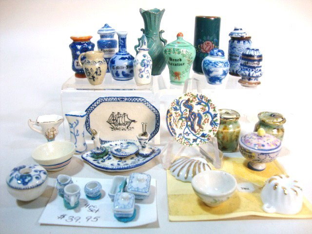 Debbie McKnight Platter: An assortment of artisan china including a Debbie McKnight Worcester plate and a platter 1.5" L, Jo Parker dinnerware, Jane Graber jug, a large assortment of apothecary jars and some commercial items.