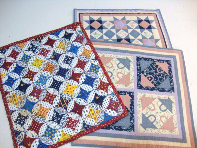 Three Amish Style Quilts: Three Amish style quilts, one basket, pastels, and others. 7 x 8"