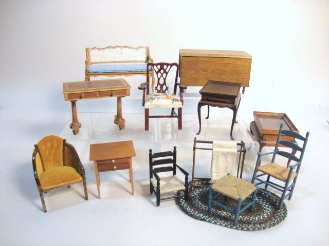 Susan Hoeltge Loveseat: Delicate loveseat with hand-woven "caned" back by Susan Hoeltge, a Joe Andrews tea table with candle slides, a miscellany of tables and chairs, and a braided rug.