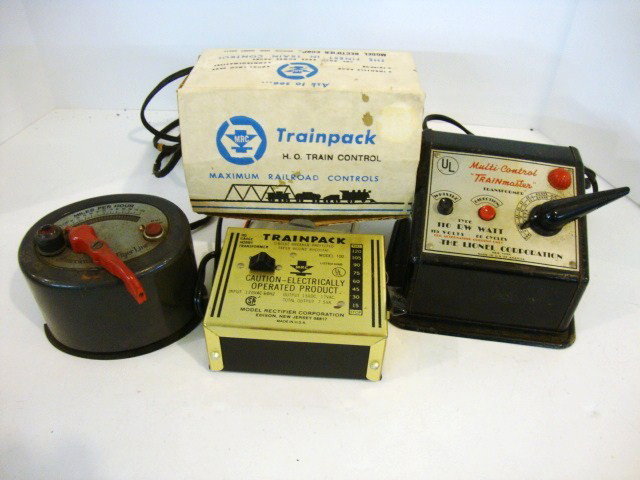 Three Toy Train Transformers: American Flyer Model 8 100 watt transformer (needs cord, cord is cracked) has original box, Lionel Type RW 110 watt, (needs cord - cord bad repair job), Model Rectifier HO Model 100 like new condition