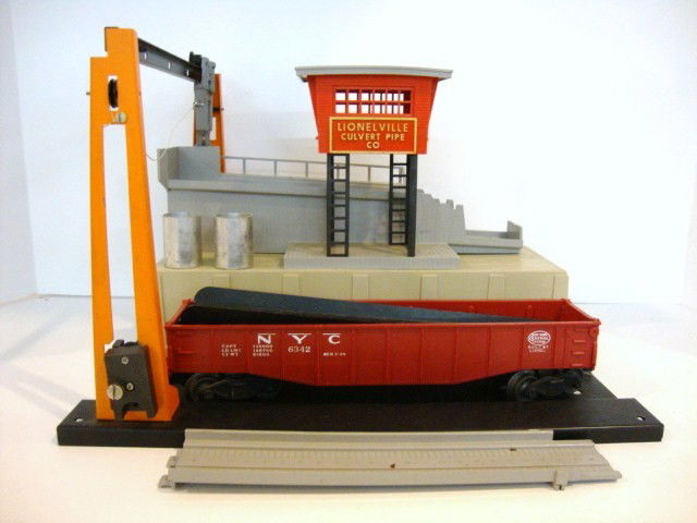 Lionel 345 Operating Culvert Unloader: Lionel 345 Operating Culvert Unolader, with original box, has car, and culverts in very good condition Bill Huber Collection