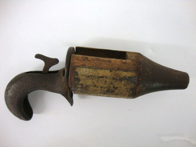 Early Iron and Steel Toy Gun: Very Early Toy Gun, possible 1860's maker unknown, cast grip w/spring steel trigger and hammer, the rest of gun wooden w/metal covering grip attaches w/2 screws 5 1/2" (l)