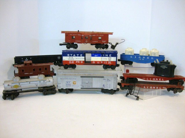 Lionel Nine Car Lionel Freight Lot: Nine Lionel Freight Cars, 6462 NYC gondola, 6818 Transformer (transformer needs to be re-attached to car), 6465 Tanker (has small chip out), 6464 Western Pacific 6017 Caboose, 6112 gondola w/3 cannist