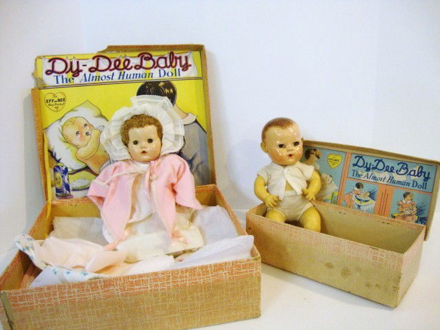 Two Effanbee Dy-Dee Baby in Original Box: Two Effanbee Dy-Dee Baby in original box, 10" in large box redressed w/layette by Dottie Huber, bo mint top, left side torn, doll in good condition