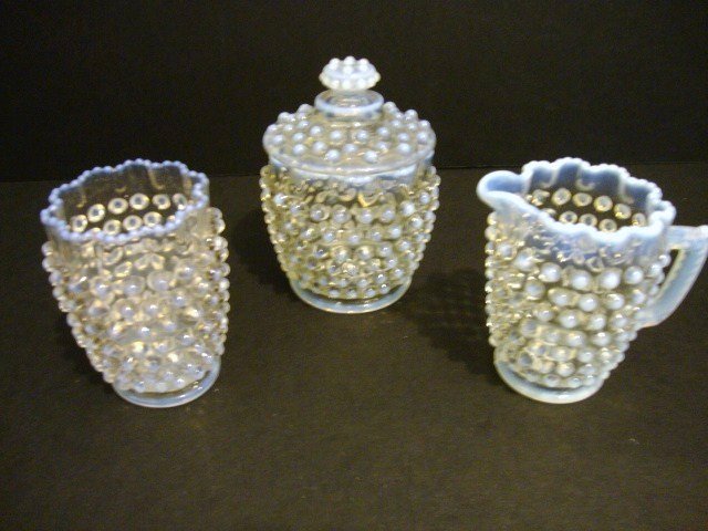 Child's Opalescent Hobnail Table Set: Three-piece opalescent hobnail table set: sugar, creamer, spooner, missing butter, 3.75" H.