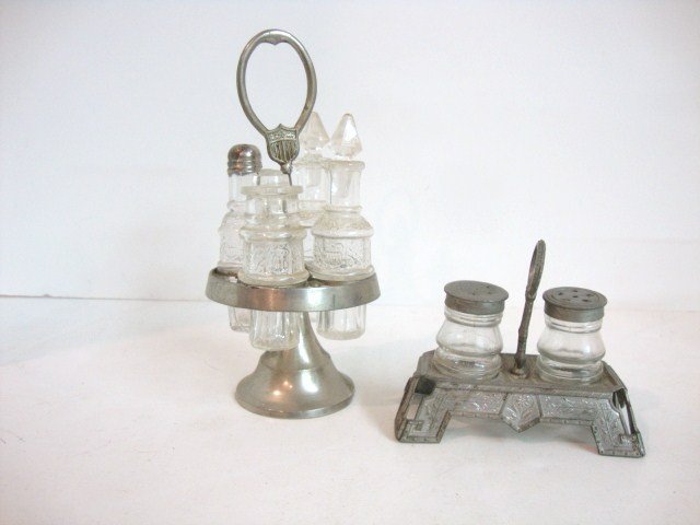 Child's Castor Set: Child's Castor Set in American Shield, 6.75" H , with four bottles and original stoppers, plus 2 bottle castor set.
