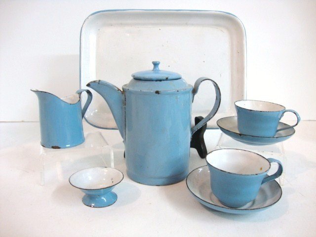 Child's Blue and White Granite Tea Set: Eight piece Blue and white Granite Tea Set with original tray, Teapot, open sugar, creamer 4.5" H.