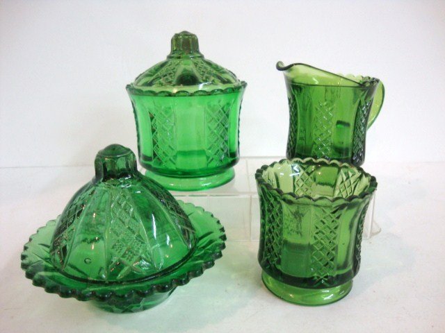 Child's Green Clear & Diamond Table Set: Four piece Green & diamond Panels Pattern glass in green Table Set: Creamer, Covered Sugar, Covered Butter, 3.75" H.