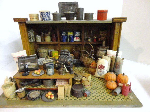 Pets Toy Grocery Store: Wonderful Store with Litho, many pieces of vintage cast iron and Pewter, Crocks, Stove, Counter, Goods, etc. This store is packed! 9" H.