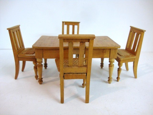 Antique Schneegass Table and Chairs: Classic extending dining table with one leaf 5" L (w/leaf), 2.5" H and four chairs with woven seats.