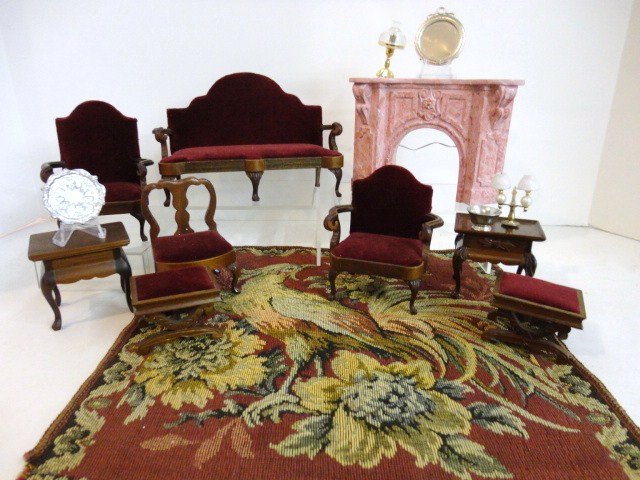 Sonia Messer English Country House Furniture: Collectible suite of walnut parlor furniture comprising a settee 6.5" L, 4.5" H (one rear leg poorly repaired), a pair of matching armchairs and footstools, side chair and two tables.