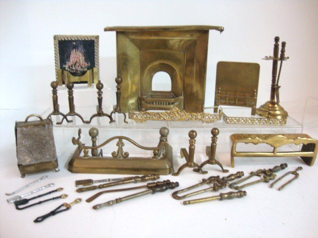 Brass and Gilt Metal Fireplace Accessories: Assortment of brass and other metal fireplace fenders, tools, coal scuttle and fireplace measuring 5" L, 4" H.
