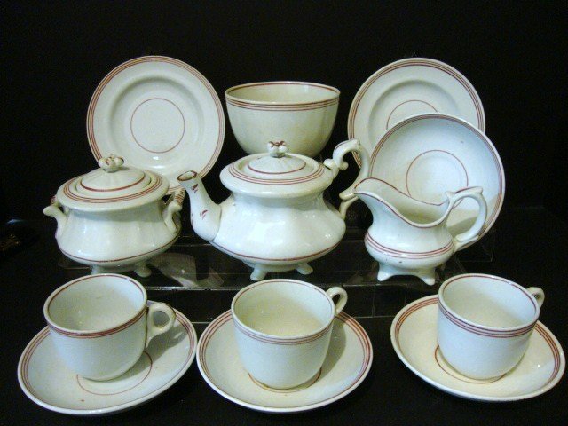 Child's Early Soft-paste Tea Set: Thirteen piece Early Soft-paste Tea Set (Red & White): Teapot, Covered Sugar, Creamer, Waste, Three cups and Saucers, three platters 4" (t)