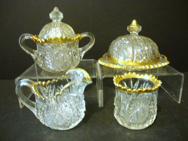 Child's Oval & Star Table Set: Four piece Oval & Star Table Set with Gold Flashing: Creamer, Covered Sugar, Covered Butter, Spooner 4 1/4" (t)