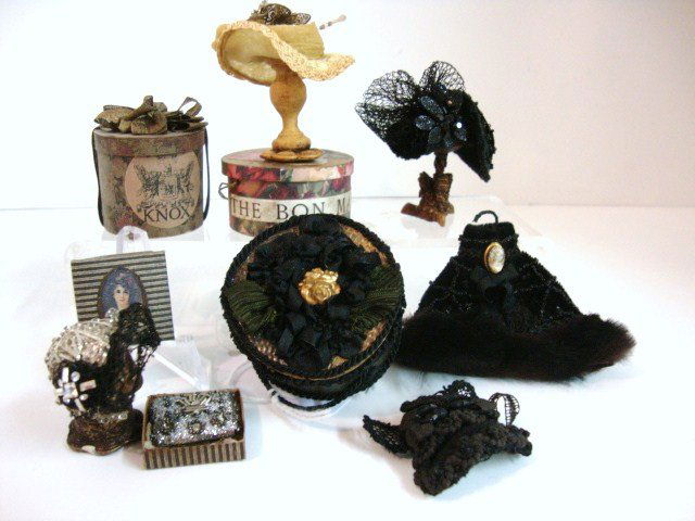 The Milliner: An assortment of lovely thing s from Susan Harmon, perfect for a milliner's shop: hats, hatboxes, capelets, etc. Astonishing vintage detail.