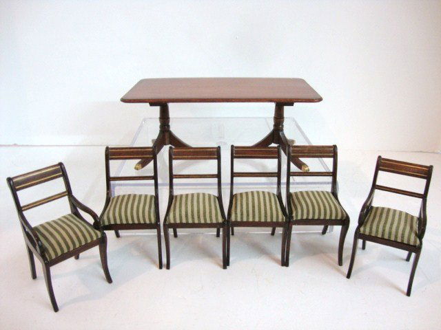 Dennis Jenvey Dining Room Table and Chairs: An elegant double pedestal rectangular dining table 6" L, 2.5" H and 3 and 3/8" W with banded edge, and six dining chairs, all by British artisan Dennis Jenvey.