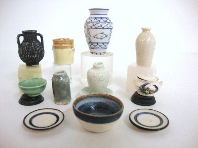 Artisan Pottery: An assortment of crocks, bowls and plates by Debbie McKnight, Jean Yingling, Carolyn Curran and Elizabeth Chambers. Tallest vase is 1.5" and has been repaired, the rest are fine.