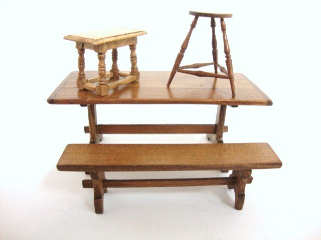 Oldham Studio and Walton Marble Half Scale Furnitu: A trestle table and bench by Oldham Studio 3" L and two stools by Nicole Walton Marble, all in half-inch scale.