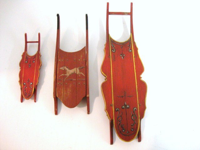 Three Painted Sleds: Three old-fashioned painted sleds, the longest 6" and signed ASB, a similar sled by the same artist in half scale, and an unsigned example presumably by the same artist.