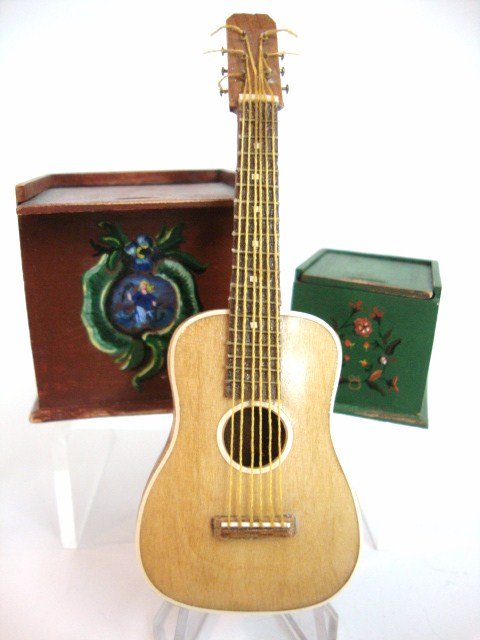 Artisan Boxes and Guitar: A pair of folk-painted boxes with sliding lids, both signed ASB and a finely crafted but unsigned guitar 4" L.