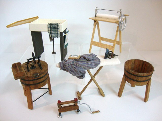 Laundry Day: Wringer and washtub by Terry O'Toole, a wringer by Roy Peters, an ironing board 3" H and an English farmhouse sink with drainboard.