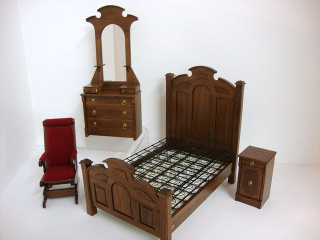 Robert Carlisle Victorian Bedroom Suite: Robert Carlisle's imposing walnut Renaissance Revival bed 7"L, 6.5"H, 5" W with Carlisle's distinctive mattress springs, matching mirrored chest with handkerchief boxes, bedside stand and a Carlisle p