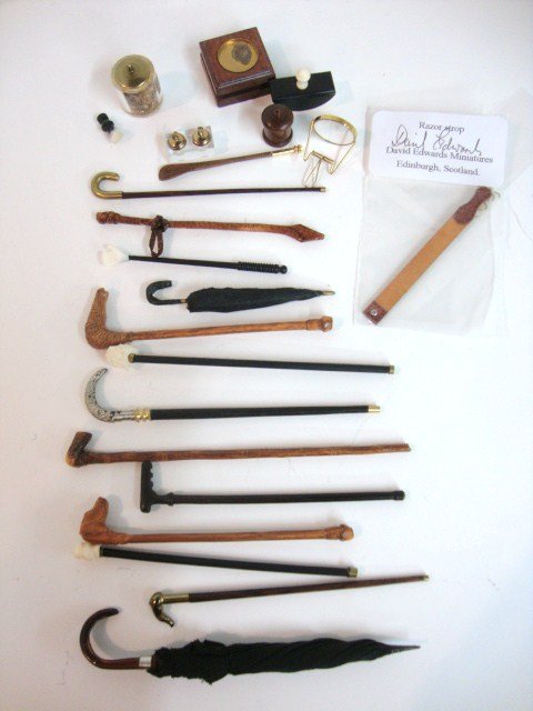 Fine Accessories for a Gentleman: Top quality masculine accessories such as canes and umbrellas by Jason Getzan, Sylvia Rountree, the Ferreras, Steak Family, Alan Waters, David Edwards and others - approx 3-4" L, also desk accessories