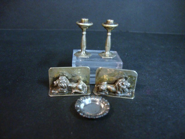 Guglielmo Cini Silver: A tarnished pair of sterling bookends 1/2" H, 7/8" L and pair of candlesticks 7/8" H by Cini, and small Cini sterling dish from the Bentley Collection via John Blauer.