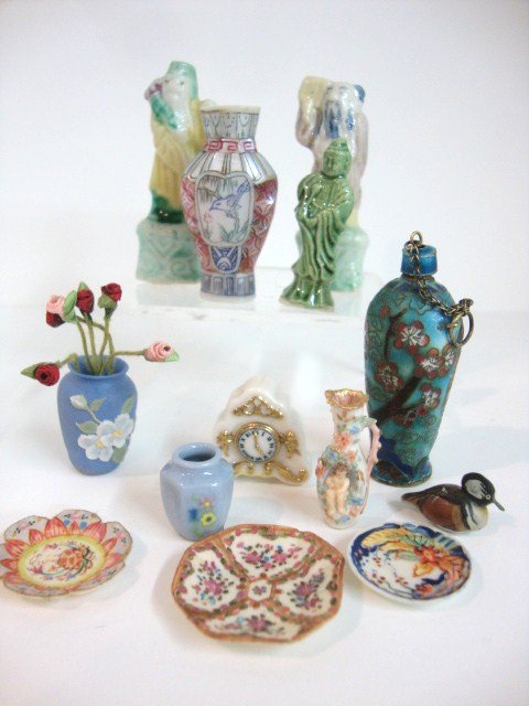 Amanda Skinner Ceramics: Three plates and a small painted decoy by Amanda Skinner with an assortment of older Chinese ceramics and cloisonné enamel. Some wax residue 2" (t).