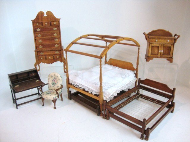 Country Bedroom Furniture: A nicely made artisan hired man's bed with trundle signed Warner 6"L, a canopy bed with trundle (needs repair), a primitive highboy (legs repaired), a sweet washstand, a Queen Anne chair and a drop-fr