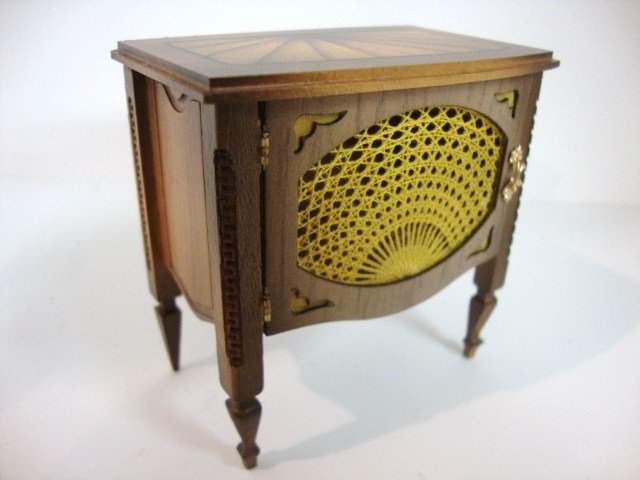 Ferd Sobol Hand Caned Chest: Serpentine door designed with cutouts and contrasting wood inlay on top. A piece for anywhere in your doll house, this is from his Legacy Collection 2 3/4" (t).