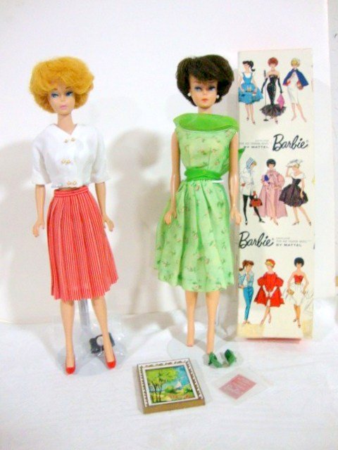 2 Bubblecut Barbies: Brunette and Blonde. Both with Touch ups. Wearing Modern Art (program a repro) and International Fair (back of one shoulder has dirt) One Box included