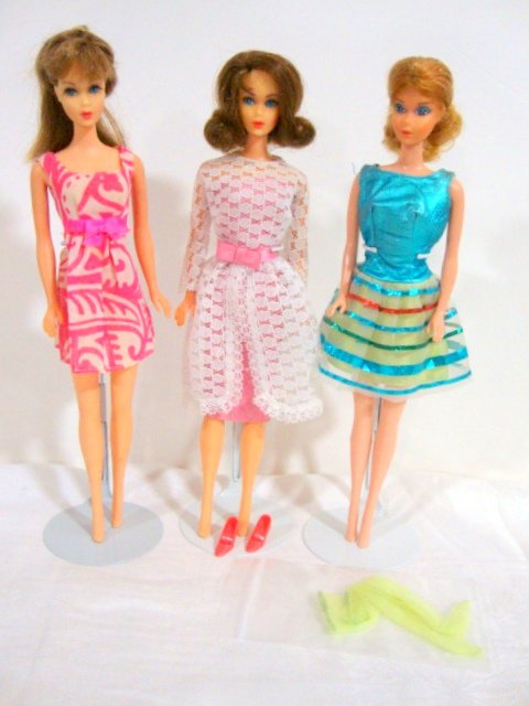 3 Mod Barbies: Brunette TNT (face pale) Brunette Flip TNT and Free Moving head on Newer body. Wearing Garden Wedding, Sears Pak pink Dress and Twinkle Togs