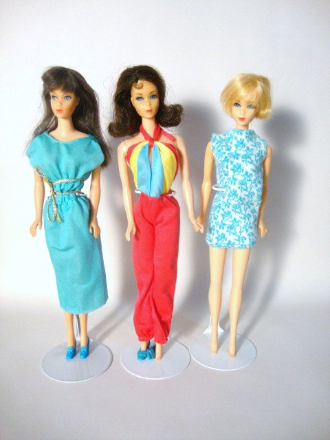 3 Mod Barbies: Brunette Standard, Brunette Flip, and Blonde Hair Fair, wearing Best buys 2769, 2554 and Sears Pak Dress