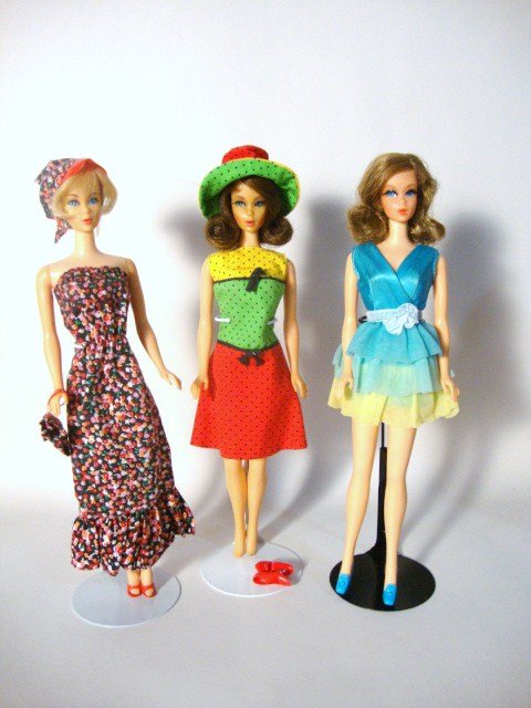 3 Mod Barbies: Blonde Hair Fair, Brunette Talker on TNT body and Brunette Flip (darkened Face) wearing 1027 and Dreamy Blues and Studio Tour