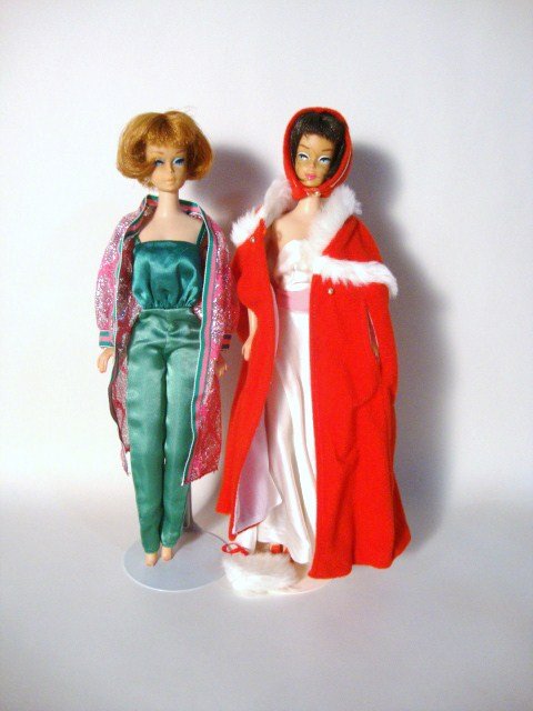 2 American Girl Barbies: Titan and Brunette American Girls, Brunettes face is darkened and touched up, wearing 1010 and 9731