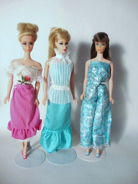 3 Mod Barbies: Truly Scrumptious, Blonde TNT and brunette Standard (face dark) wearing Firelights and 2786 and 2784