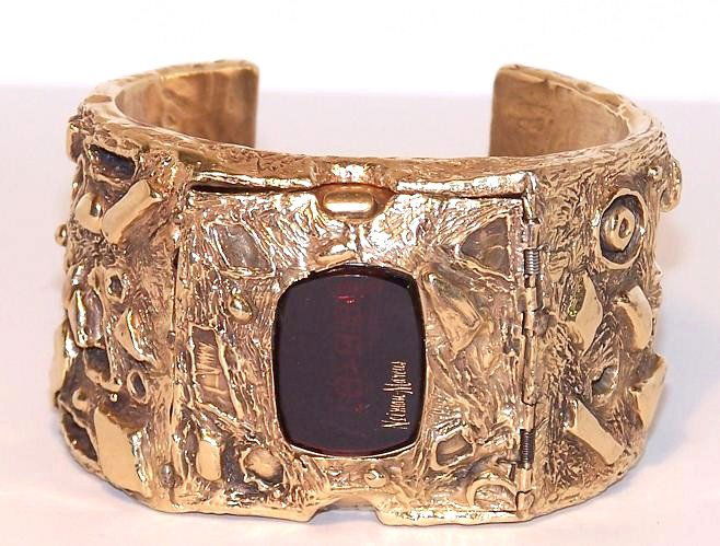 Heavy Arthur King Neiman Marcus 14K Cuff Watch: Attributed to Arthur King. 14K Gold Cuff watch. For Neiman Marcus. Rare 14 kt. Pulsar 1973 Digital Watch Set in serial number is 136718 . Cuff is 1 6/8" wide. Weighs 507 grams