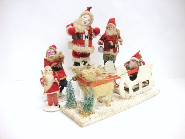 Japanese Santa Figures: Five Japanese Santa Figures, on in original box with sleigh and reindeer, other standing on bases box is largest 5 x 10"