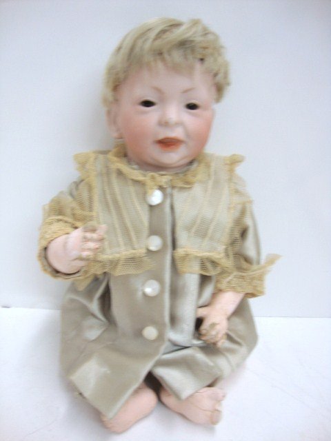 Kaiser Baby: Kaiser Baby, Bisque dome head, composition bent limb body, sleep glass eyes, open mouth, great face, 10" Body has cracks foot is repaired, redressed, original wig.