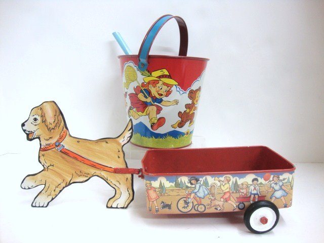 Ohio Art Tin Pail and Tin Wagon: Dogcart 12", dog 5" (h)- not marked, sand bucket by Ohio Art 7" (h), has boy chasing bear w/gun